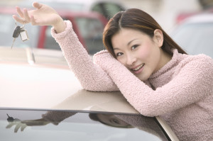 Smiling Woman Holding Car Keys